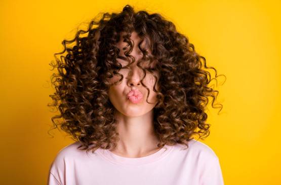 How to Achieve Bouncy, Full Curls with the Right Hair Additions Hair Additions